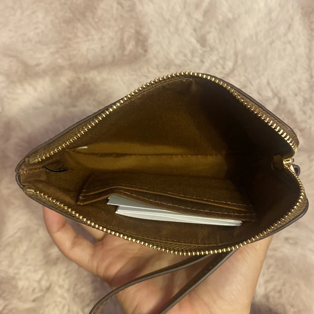 Brand new coach wristlet in brown signature canvas